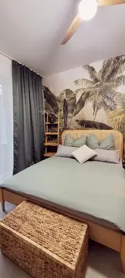 Ein Bett oder Betten in einem Zimmer der Unterkunft Apartment Bali - live better with AH Living