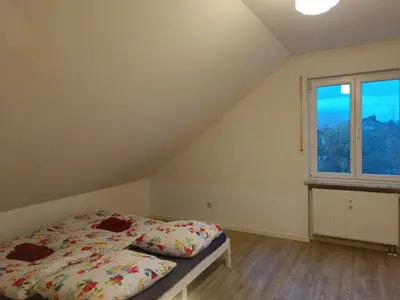 Ein Bett oder Betten in einem Zimmer der Unterkunft Schöne Wohnung in S-Bahn-Nähe