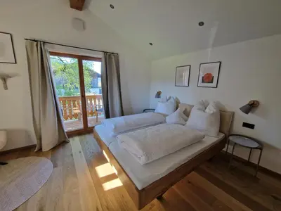 Ein Bett oder Betten in einem Zimmer der Unterkunft Bauernhofchalet Geigerhof