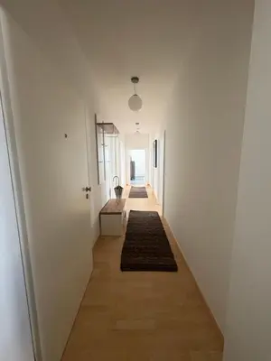 Ein Bett oder Betten in einem Zimmer der Unterkunft Zentrale Altbauwohnung