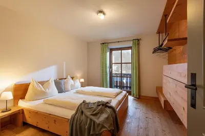 Ein Bett oder Betten in einem Zimmer der Unterkunft Almgasthof Grafenherberg