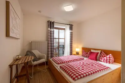 Ein Bett oder Betten in einem Zimmer der Unterkunft Almgasthof Grafenherberg