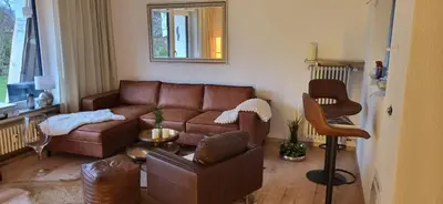 Ein Sitzbereich in der Unterkunft Ammergaufeeling mit einmaligem Bergblick und Terrasse