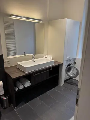 Ein Badezimmer in der Unterkunft Royal GmbH