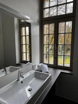 Ein Badezimmer in der Unterkunft Royal GmbH