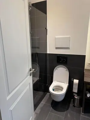 Ein Badezimmer in der Unterkunft Royal GmbH