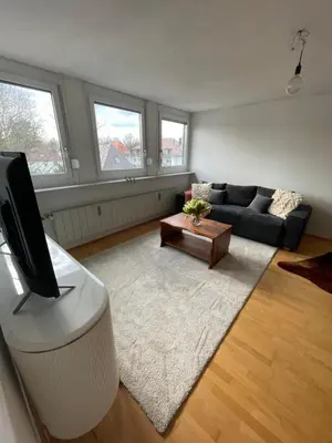 Ein Sitzbereich in der Unterkunft Quiet Center Apartment - 10 min to Center & Oktoberfest - Free Parking - near Nymphenburg Palace & Botanical garden