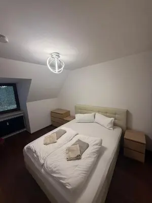 Ein Bett oder Betten in einem Zimmer der Unterkunft Old town comfort and cozy apartment 2