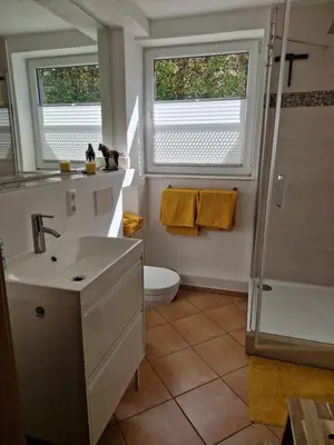 Ein Badezimmer in der Unterkunft See-Moment-Appartment