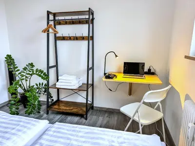 Ein Bett oder Betten in einem Zimmer der Unterkunft Geräumige Ferienwohnung mit Parkplatz direkt an der S-Bahn nach München