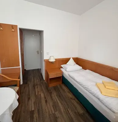 Ein Bett oder Betten in einem Zimmer der Unterkunft Hotel zum Unterwirt