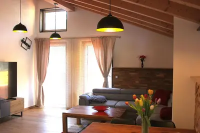 Ein Sitzbereich in der Unterkunft Panorama Suite