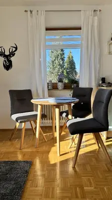 Ein Sitzbereich in der Unterkunft Alpspitzenblick