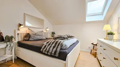 Ein Bett oder Betten in einem Zimmer der Unterkunft Modernes Alpen-Apartment nahe Neuschwanstein