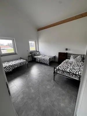 Ein Bett oder Betten in einem Zimmer der Unterkunft Bade Homes