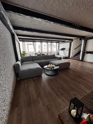 Ein Sitzbereich in der Unterkunft Bade Homes Deluxe