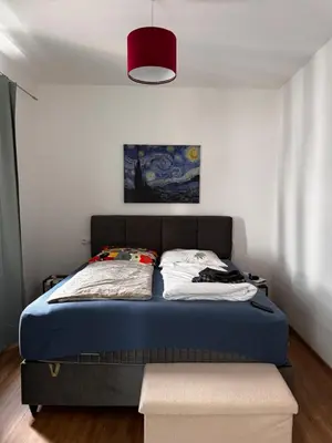 Ein Bett oder Betten in einem Zimmer der Unterkunft Bade Homes Deluxe