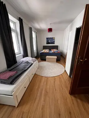 Ein Bett oder Betten in einem Zimmer der Unterkunft Bade Homes Deluxe
