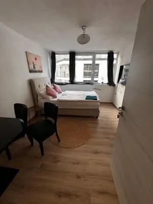 Ein Bett oder Betten in einem Zimmer der Unterkunft Bade Appartements