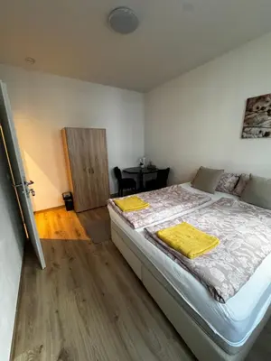 Ein Bett oder Betten in einem Zimmer der Unterkunft Bade Appartements