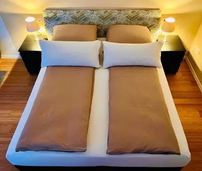 Ein Bett oder Betten in einem Zimmer der Unterkunft Studio Magnolien Apartment