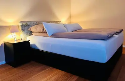 Ein Bett oder Betten in einem Zimmer der Unterkunft Studio Magnolien Apartment