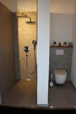 Ein Badezimmer in der Unterkunft cozy cube 1 Luxury Apartments, nah an der Messe, 30 Minuten zu den Bergen und Seen, 20 Minuten nach München