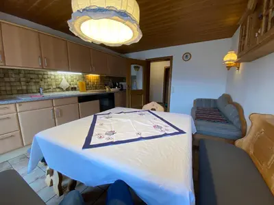 Ein Sitzbereich in der Unterkunft Nudlbichlerhof