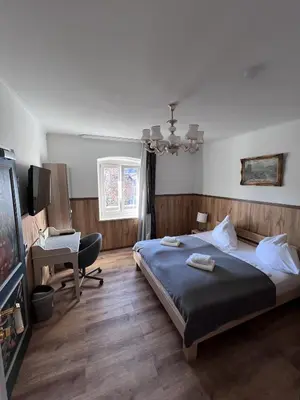 Ein Bett oder Betten in einem Zimmer der Unterkunft Hotel Zum Lamm