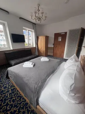 Ein Bett oder Betten in einem Zimmer der Unterkunft Hotel Zum Lamm
