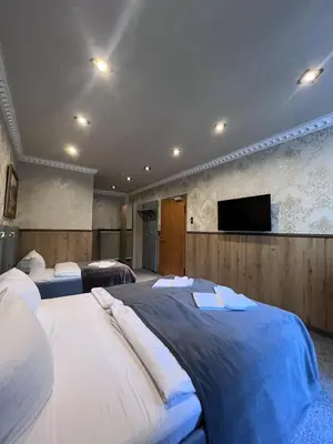 Ein Bett oder Betten in einem Zimmer der Unterkunft Hotel Zum Lamm