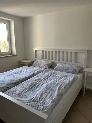 Ein Bett oder Betten in einem Zimmer der Unterkunft 2 Personen Appartement Sonnental