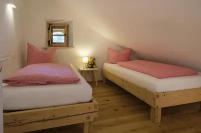 Ein Bett oder Betten in einem Zimmer der Unterkunft Ferienwohnung Singer