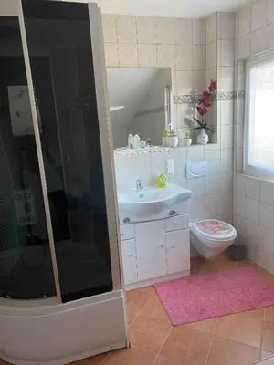 Ein Badezimmer in der Unterkunft Ferienwohnung Alpenblick