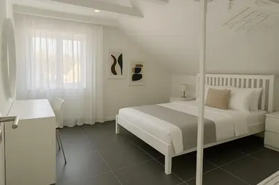 Ein Bett oder Betten in einem Zimmer der Unterkunft Studio Eleven - Loft mit Kicker