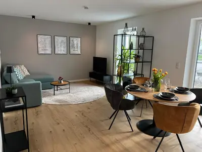 Ein Sitzbereich in der Unterkunft Olea Prien - Chiemsee Apartment
