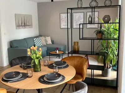 Ein Sitzbereich in der Unterkunft Olea Prien - Chiemsee Apartment