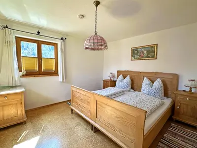 Ein Bett oder Betten in einem Zimmer der Unterkunft Ferienhaus Labenbach