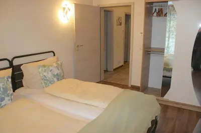 Ein Bett oder Betten in einem Zimmer der Unterkunft Dolina DeLuxe