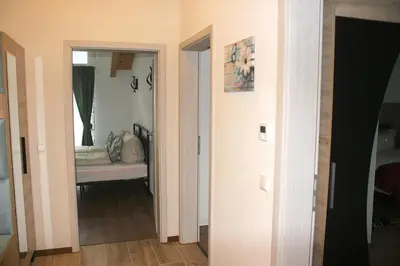 Ein Bett oder Betten in einem Zimmer der Unterkunft Dolina DeLuxe