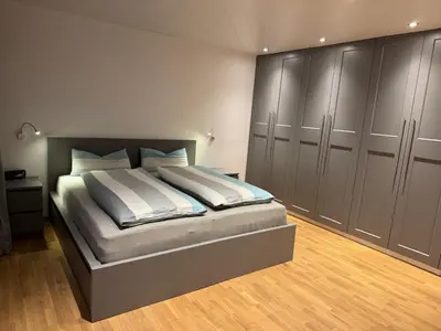 Ein Bett oder Betten in einem Zimmer der Unterkunft Sonnenhang Bayern