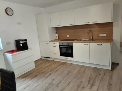Küche/Küchenzeile in der Unterkunft Ferienwohnung zum Schneiderkramer