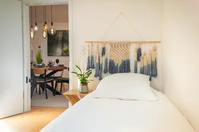 Ein Bett oder Betten in einem Zimmer der Unterkunft La Casa Bonita