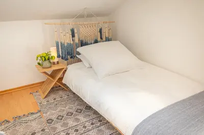 Ein Bett oder Betten in einem Zimmer der Unterkunft La Casa Bonita