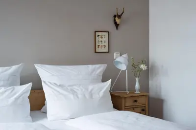 Ein Bett oder Betten in einem Zimmer der Unterkunft Wailtl Hotel