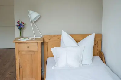 Ein Bett oder Betten in einem Zimmer der Unterkunft Wailtl Hotel