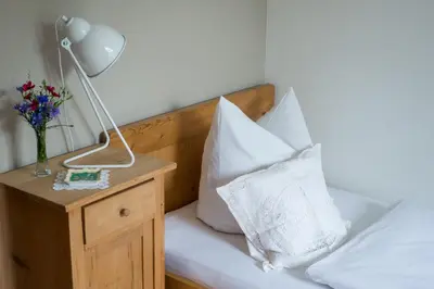 Ein Bett oder Betten in einem Zimmer der Unterkunft Wailtl Hotel