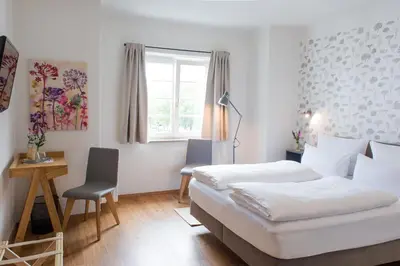 Ein Bett oder Betten in einem Zimmer der Unterkunft Wailtl Hotel