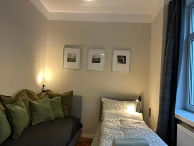 Ein Bett oder Betten in einem Zimmer der Unterkunft Hello Künstlerflair