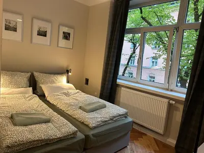 Ein Bett oder Betten in einem Zimmer der Unterkunft Hello Künstlerflair